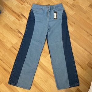 Contrast panel detail straight leg jeans. Never worn.